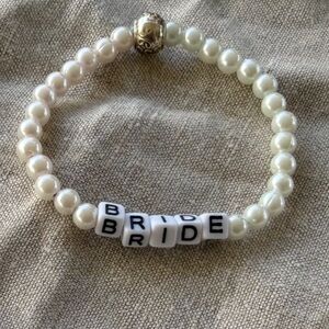 For the special girl on her wedding day the bride . 7 inches made with pearls :